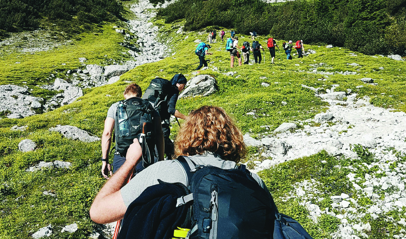 Group People Hiking on Hill